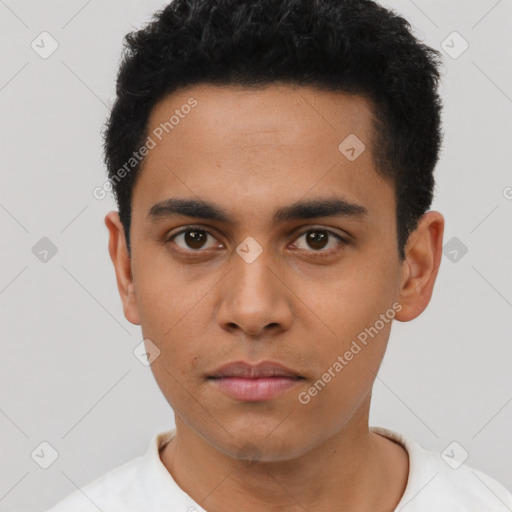 Neutral latino young-adult male with short  black hair and brown eyes