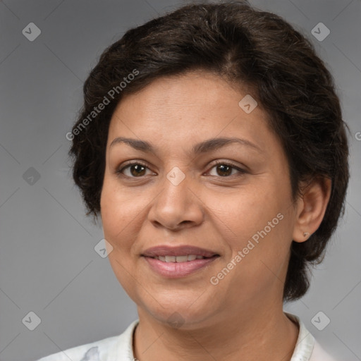 Joyful white adult female with medium  brown hair and brown eyes