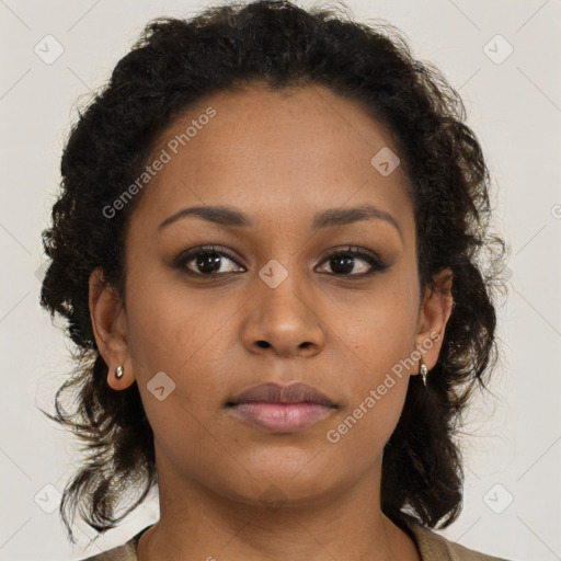 Neutral black young-adult female with medium  brown hair and brown eyes