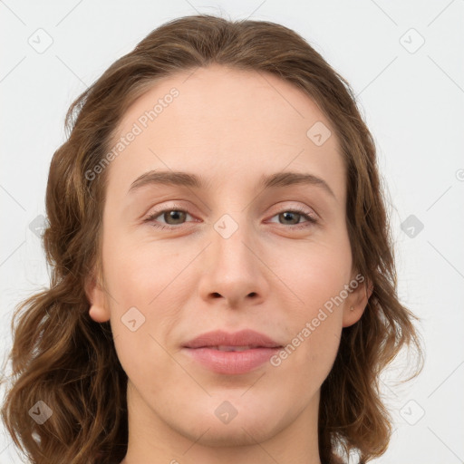 Joyful white young-adult female with long  brown hair and green eyes