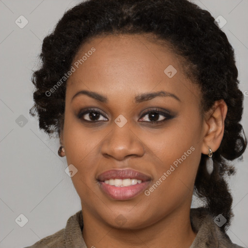 Joyful black young-adult female with medium  brown hair and brown eyes