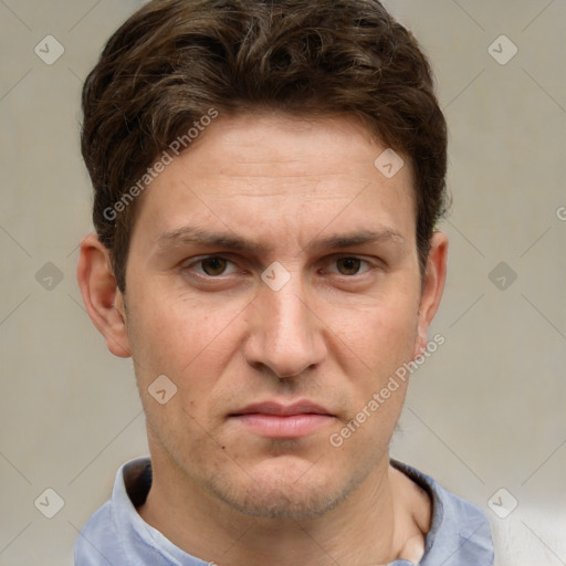 Joyful white adult male with short  brown hair and grey eyes