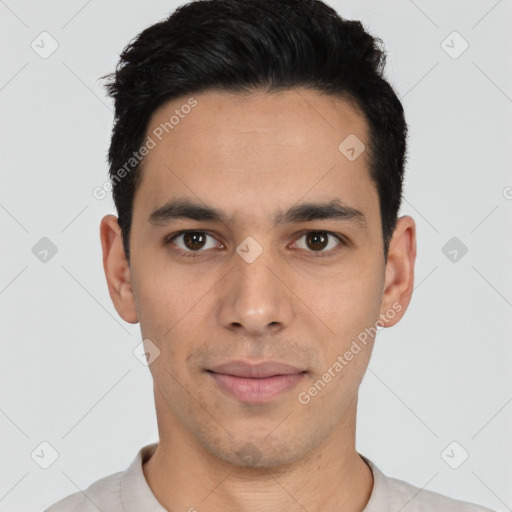 Joyful latino young-adult male with short  black hair and brown eyes