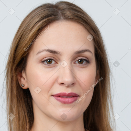 Joyful white young-adult female with long  brown hair and green eyes