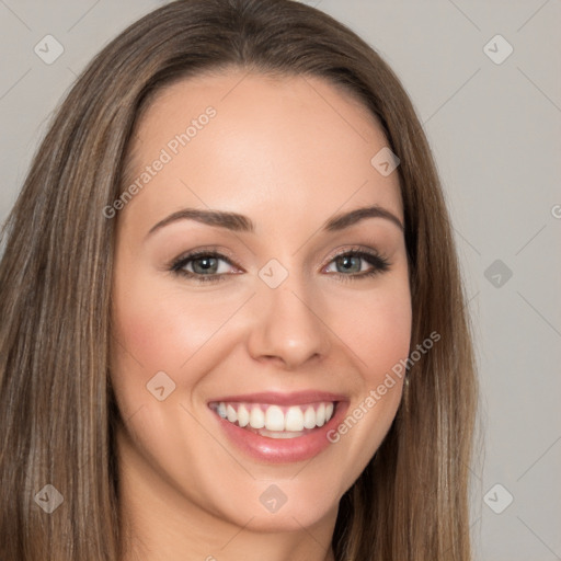 Joyful white young-adult female with long  brown hair and brown eyes