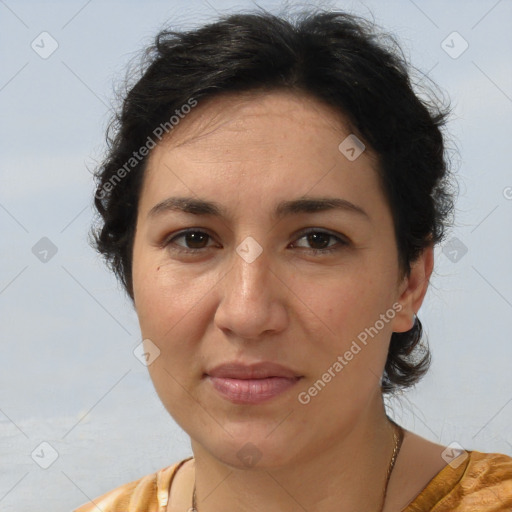 Joyful white adult female with medium  brown hair and brown eyes