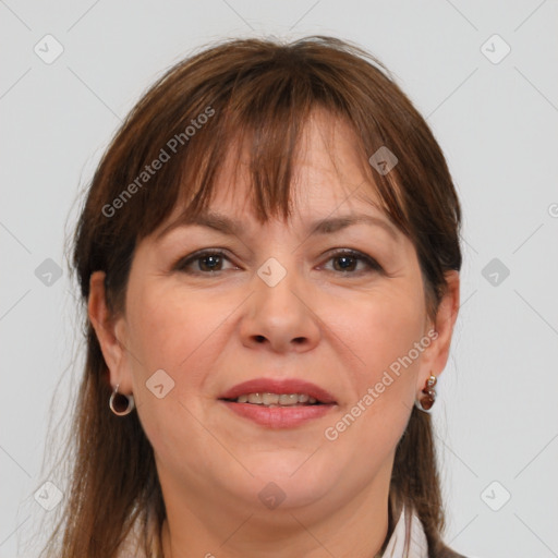 Joyful white adult female with medium  brown hair and brown eyes