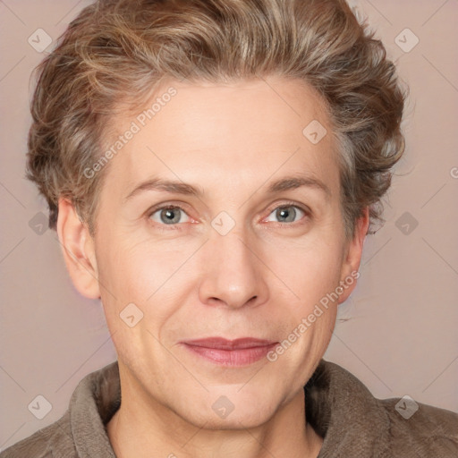 Joyful white adult male with short  brown hair and grey eyes