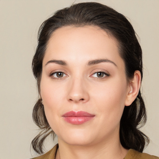 Joyful white young-adult female with medium  brown hair and brown eyes