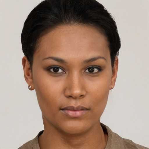 Neutral latino young-adult female with short  brown hair and brown eyes