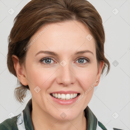 Joyful white young-adult female with medium  brown hair and blue eyes