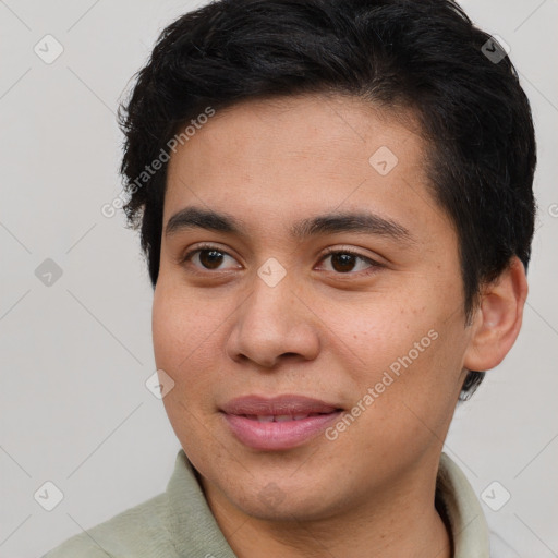 Joyful asian young-adult male with short  brown hair and brown eyes