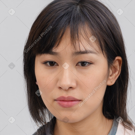 Neutral white young-adult female with medium  brown hair and brown eyes