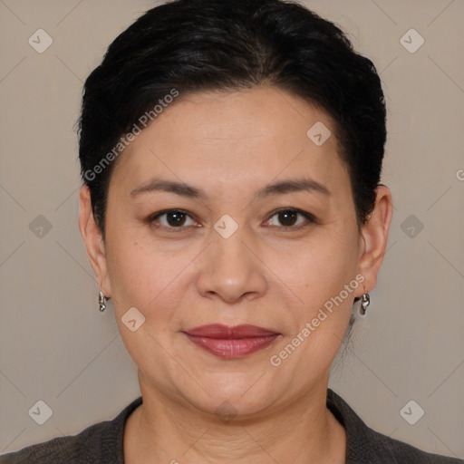 Joyful white adult female with short  brown hair and brown eyes