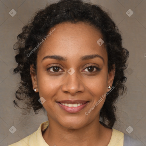 Joyful black young-adult female with medium  brown hair and brown eyes