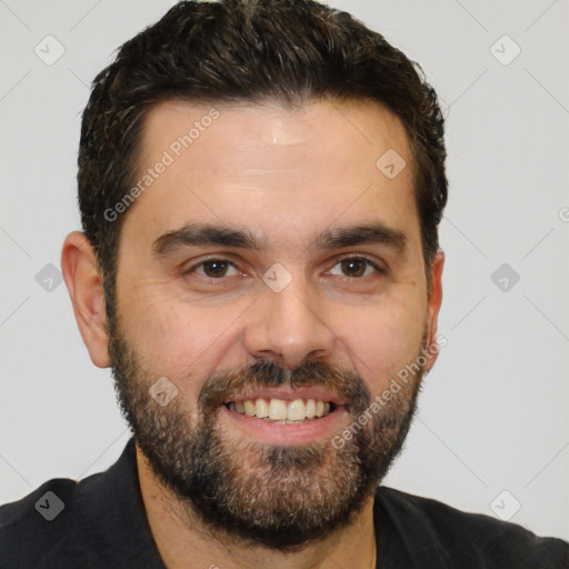 Joyful white young-adult male with short  black hair and brown eyes