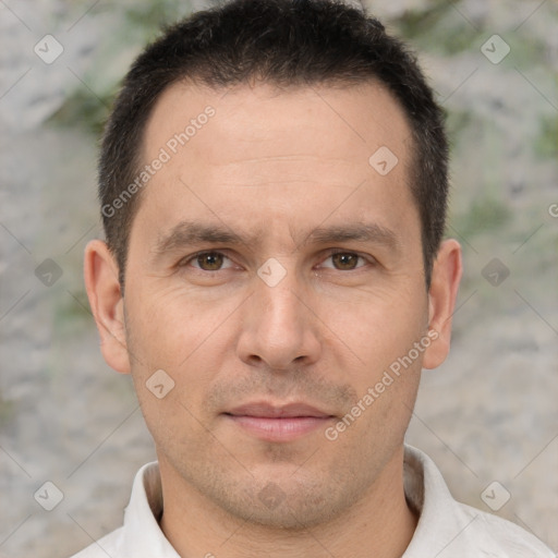 Joyful white adult male with short  brown hair and brown eyes