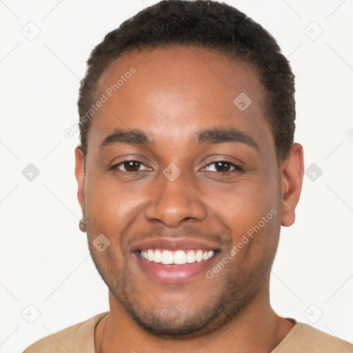 Joyful black young-adult male with short  brown hair and brown eyes