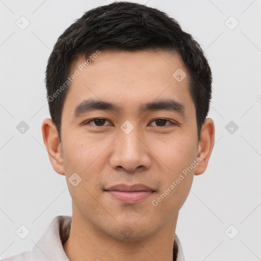 Joyful latino young-adult male with short  brown hair and brown eyes