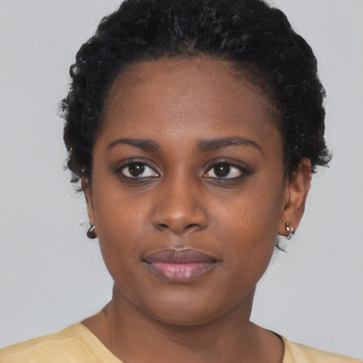 Neutral black young-adult female with short  black hair and brown eyes