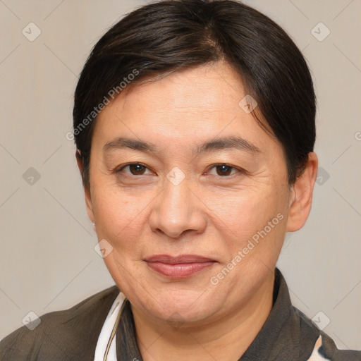 Joyful white adult female with medium  brown hair and brown eyes