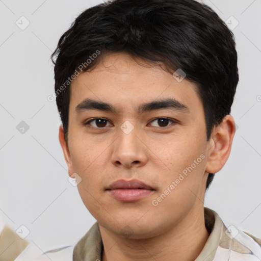 Neutral asian young-adult male with short  brown hair and brown eyes