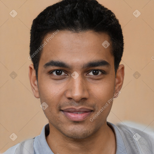 Joyful latino young-adult male with short  black hair and brown eyes