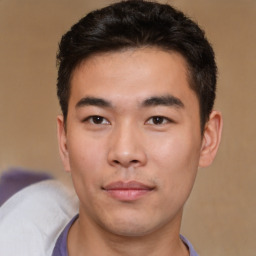 Neutral asian young-adult male with short  brown hair and brown eyes