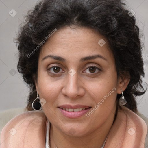 Joyful white adult female with long  brown hair and brown eyes