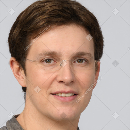 Joyful white adult male with short  brown hair and grey eyes