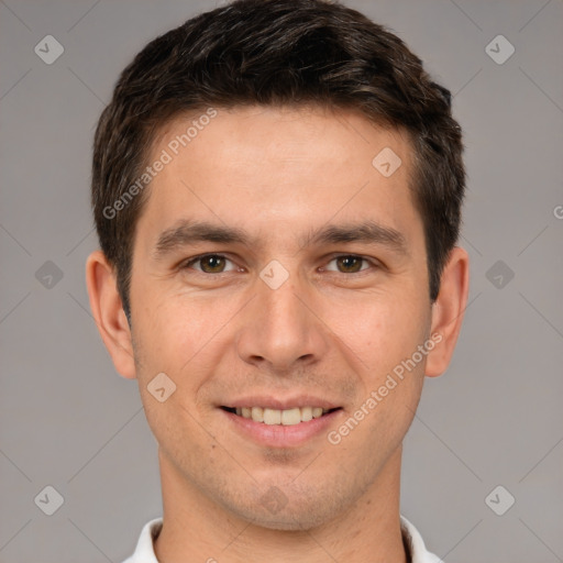 Joyful white young-adult male with short  brown hair and brown eyes