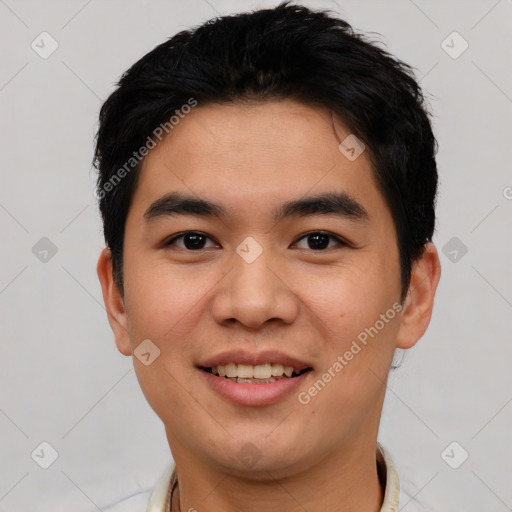 Joyful white young-adult male with short  black hair and brown eyes