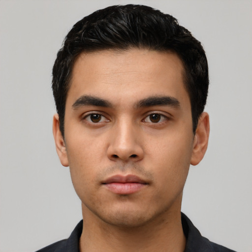 Neutral latino young-adult male with short  black hair and brown eyes