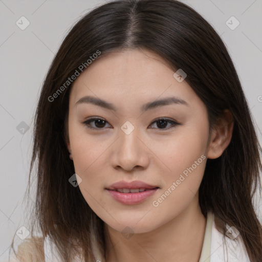 Joyful asian young-adult female with long  brown hair and brown eyes