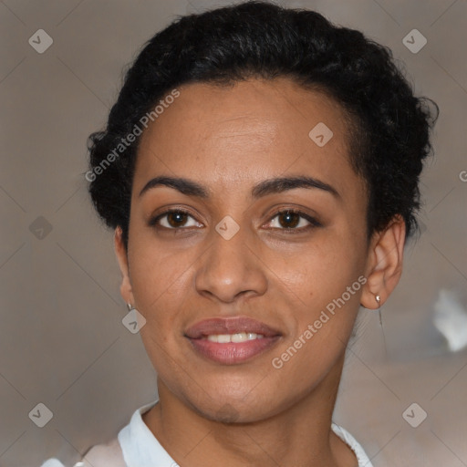 Joyful latino young-adult female with short  black hair and brown eyes