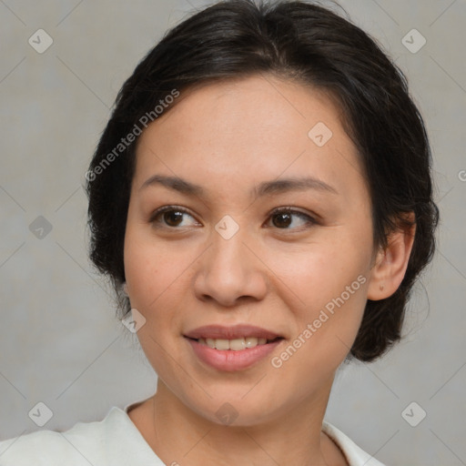 Joyful asian young-adult female with medium  brown hair and brown eyes