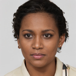 Neutral black young-adult female with short  brown hair and brown eyes