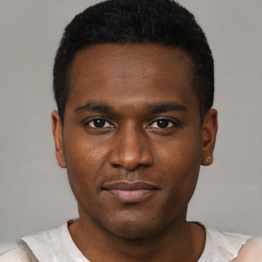Neutral black young-adult male with short  brown hair and brown eyes