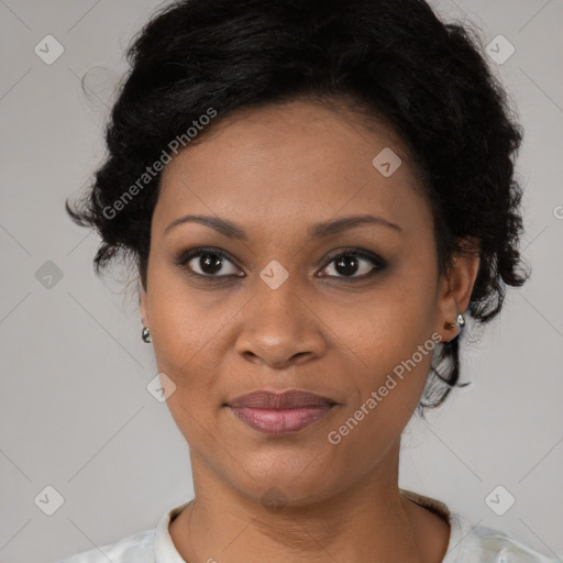 Joyful black adult female with medium  brown hair and brown eyes