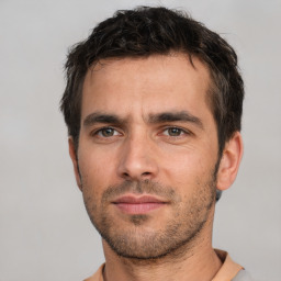 Neutral white adult male with short  black hair and brown eyes