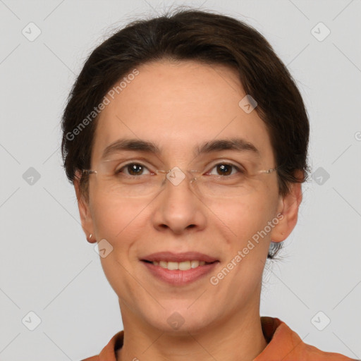 Joyful white adult female with short  brown hair and brown eyes