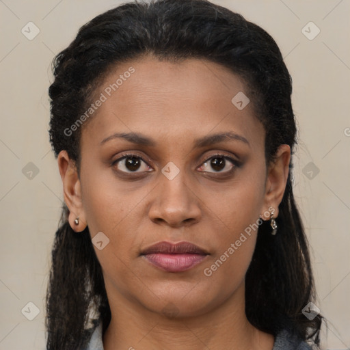 Joyful latino young-adult female with long  brown hair and brown eyes