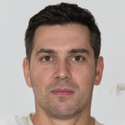 Neutral white adult male with short  brown hair and brown eyes