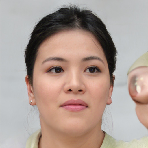 Neutral white young-adult female with short  brown hair and brown eyes