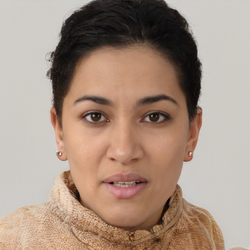 Joyful latino young-adult female with short  brown hair and brown eyes