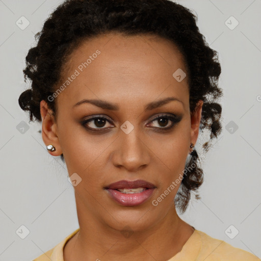 Joyful black young-adult female with short  brown hair and brown eyes