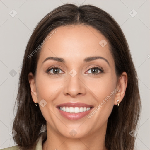 Joyful white young-adult female with long  brown hair and brown eyes