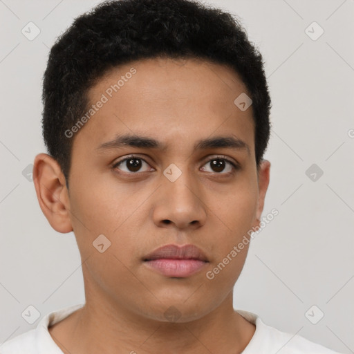 Neutral latino young-adult male with short  brown hair and brown eyes