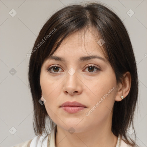 Neutral white young-adult female with medium  brown hair and brown eyes