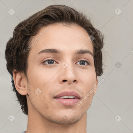 Neutral white young-adult male with short  brown hair and grey eyes